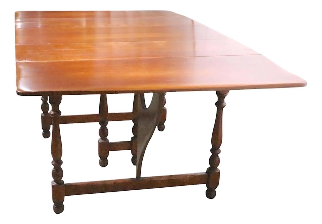 Cushman Danby Maple Butterfly Extension Dining Table N 7130: Cushman Danby Maple Butterfly Extension Dining Table N 7130 This mid-20th century Cushman Colonial Danby Model N 7130 butterfly drop leaf extension dining table features classic design and superior cr