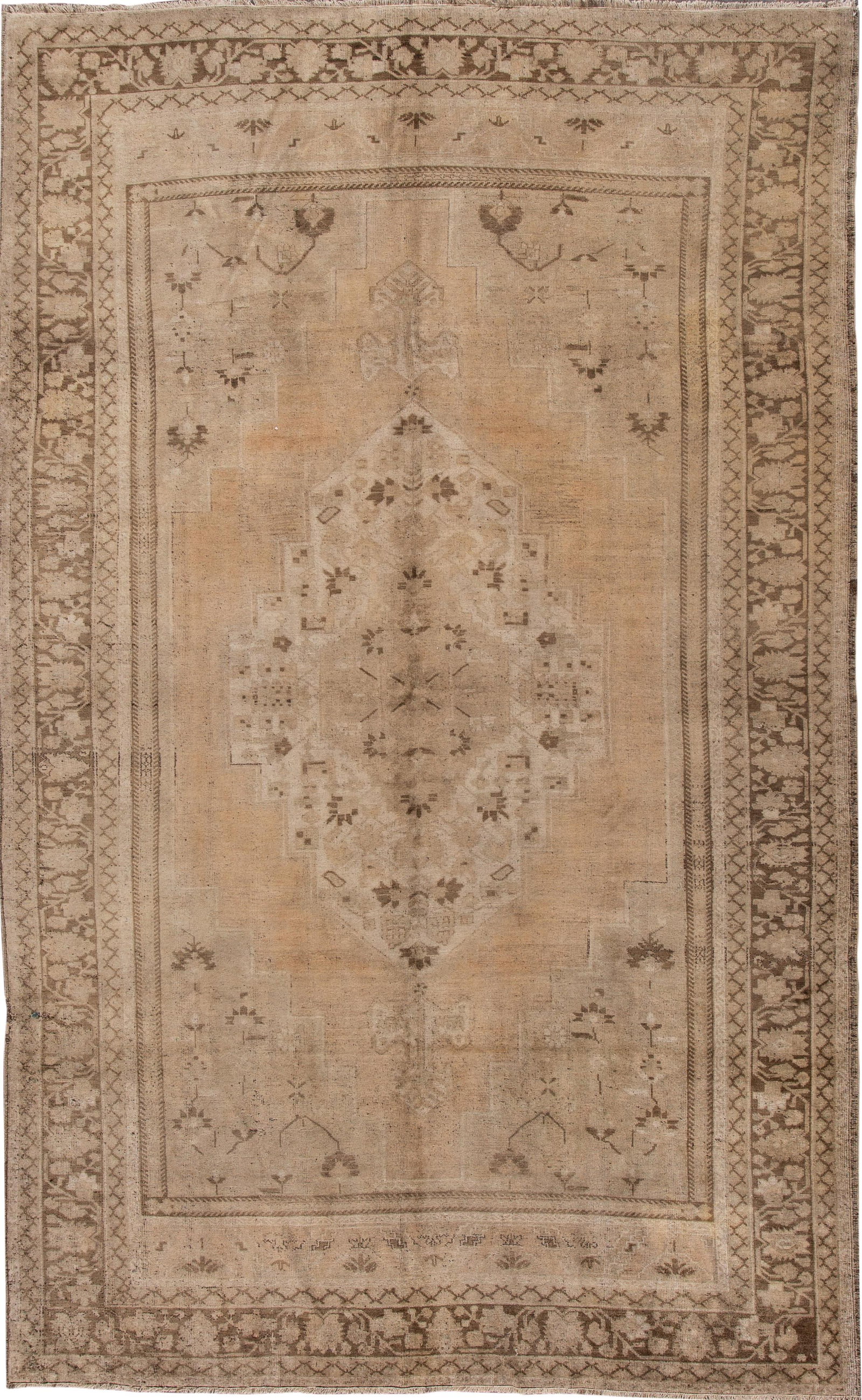 Antique Early 20th Century Khotan Wool Rug 7'6 x 12'2 Tan: Antique Early 20th Century Khotan Wool Rug 7'6 x 12'2 Tan This exquisite early 20th-century antique Khotan rug showcases a stunning central medallion design against a tan field, complemented by peach 