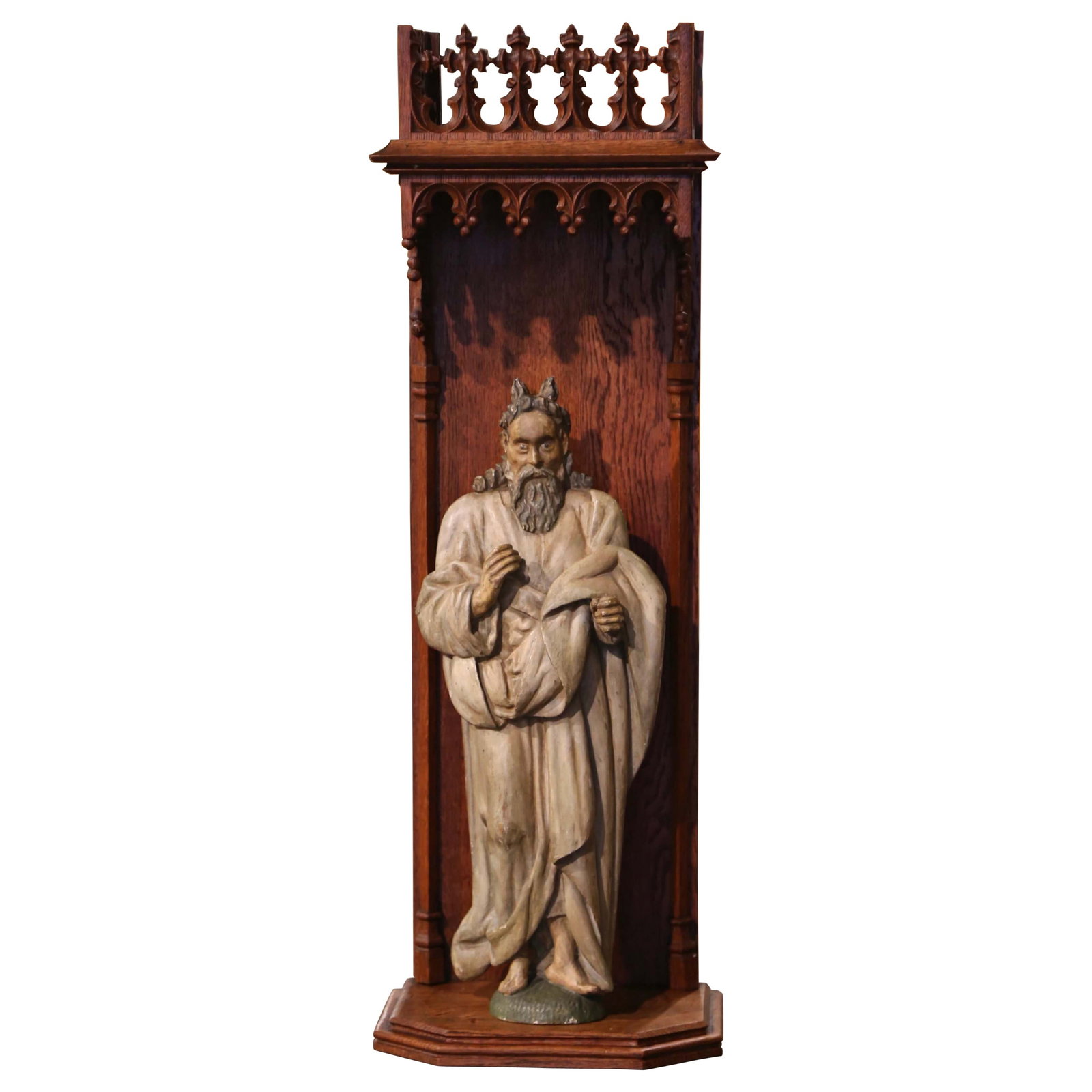 French Polychrome Moses Figure in Gothic Oak Shrine: French Polychrome Moses Figure in Gothic Oak Shrine This mid-18th century French sculpture features a hand-carved figure of Moses, crafted around 1760 and housed within its original Gothic oak shrine.