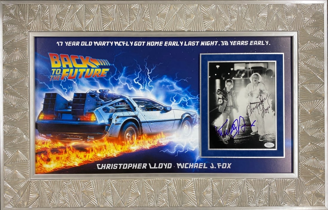 Michael J Fox Christopher Lloyd Signed Back to the Future Framed Photo JSA COA 21x34: Michael J Fox Christopher Lloyd Signed Back to the Future Framed Photo JSA COA 21x34 This stunning piece features a signed 8"x10" black and white photo from the iconic movie "Back to the Future," auto