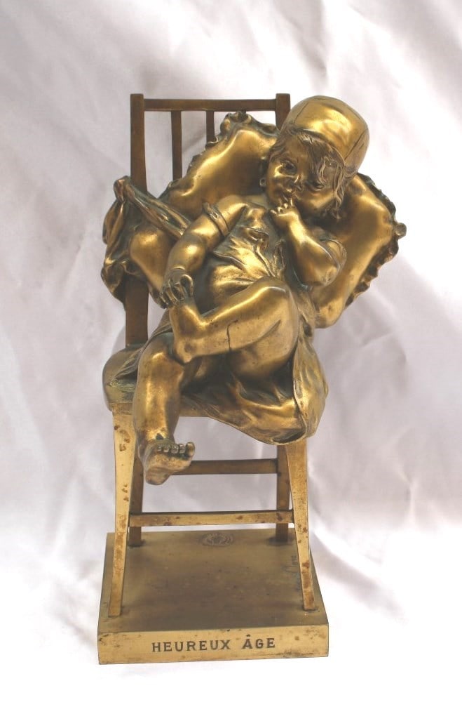 1900 Juan Clara Dore Bronze Statue Heureux Age Signed Antique: 1900 Juan Clara Dore Bronze Statue Heureux Age Signed Antique This exquisite 1900 French dore bronze statue, titled "HEUREUX AGE," features a girl elegantly seated on a chair, created by the notable S