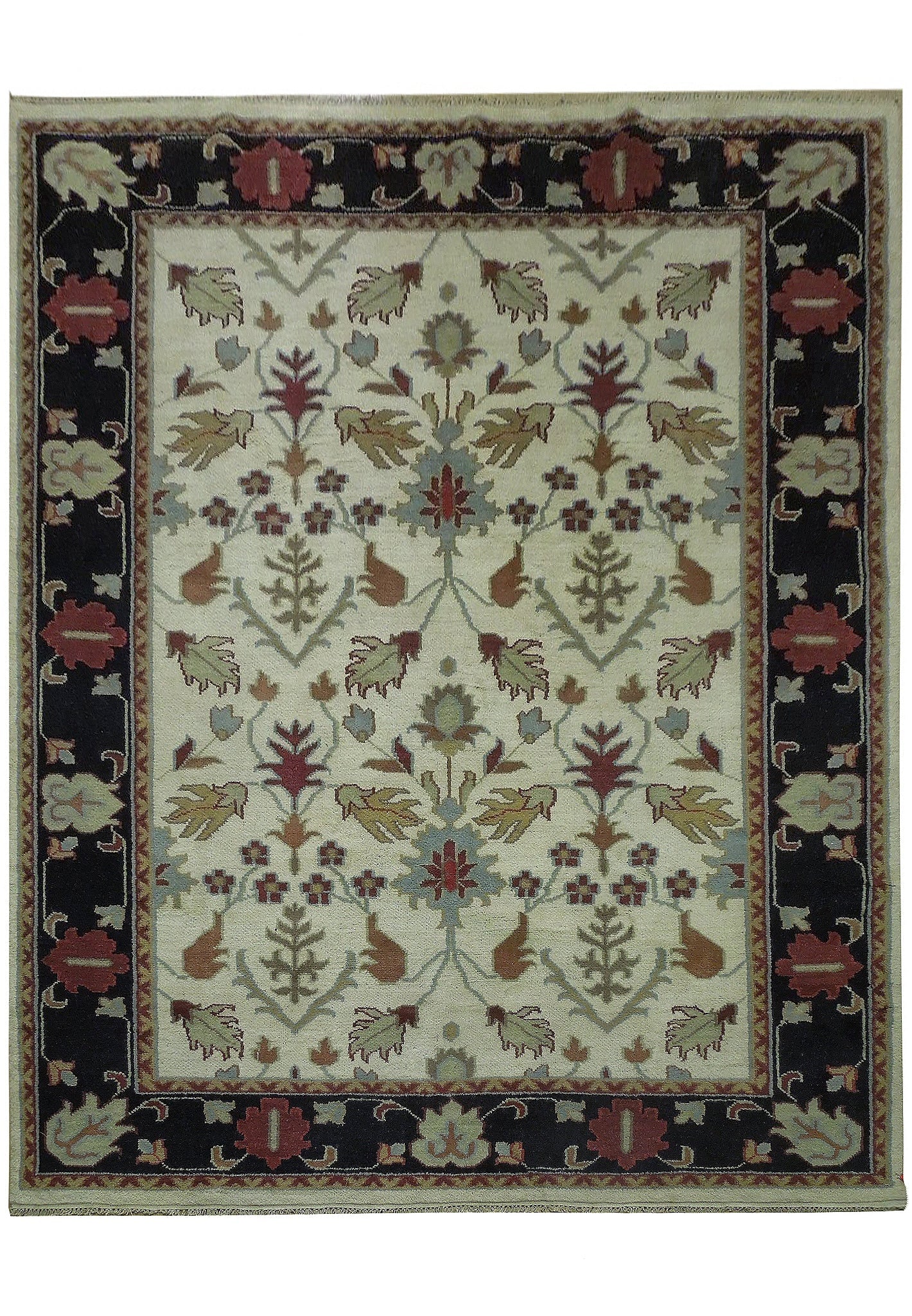 8 x 10 Hand-Knotted Indian Wool Area Rug Traditional Pattern: 8 x 10 Hand-Knotted Indian Wool Area Rug Traditional Pattern Free continental US Shipping This 8 x 10 hand-knotted area rug is crafted from wool and made in India. It features a traditional pattern wi
