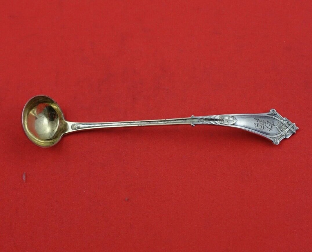 Wood and Hughes Viola Sterling Silver Mustard Ladle Gold Washed 5 1/4 in: Wood and Hughes Viola Sterling Silver Mustard Ladle Gold Washed 5 1/4 in This exquisite mustard ladle from the Viola pattern by Wood and Hughes is crafted from high-quality sterling silver and feature