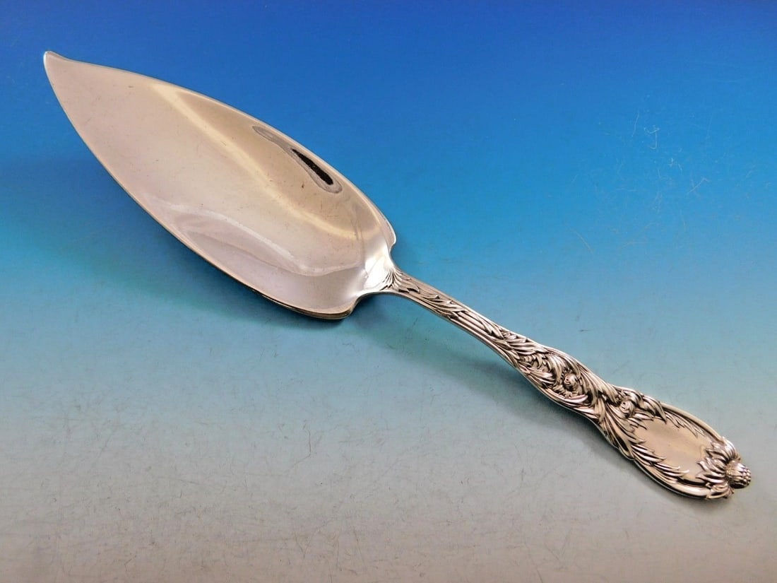 Tiffany & Co. Sterling Silver Fish Server 11.5 Inch Chrysanthemum Pattern: Tiffany & Co. Sterling Silver Fish Server 11.5 Inch Chrysanthemum Pattern This sterling silver fish server features the elegant Chrysanthemum pattern by Tiffany & Co., originally designed in 1880 by C