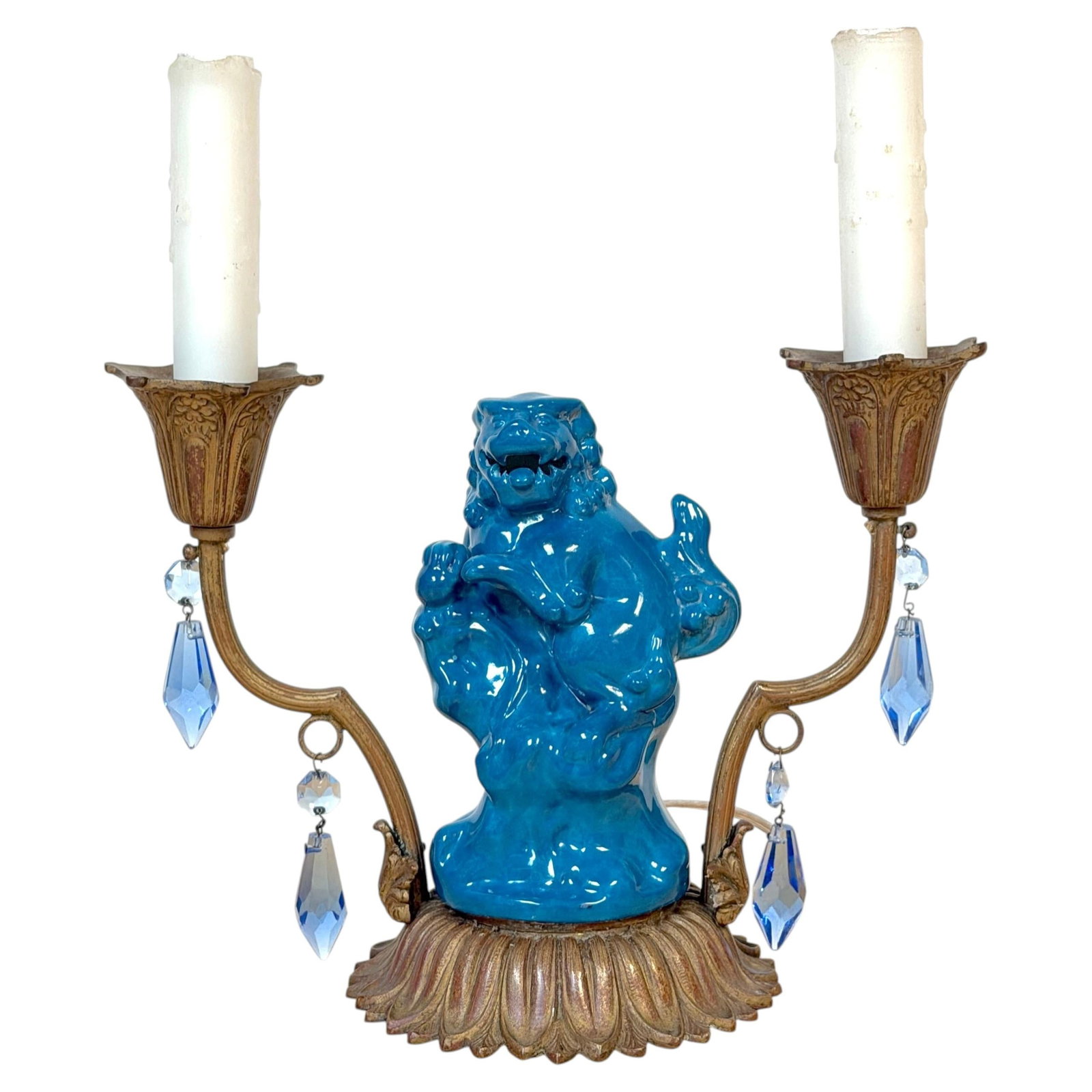 Belle Epoque French Chinoiserie Foo Dog Porcelain and Bronze Two-Light Lamp: Belle Epoque French Chinoiserie Foo Dog Porcelain and Bronze Two-Light Lamp This French Belle Epoque candelabra lamp showcases a vibrant turquoise flambe porcelain foo dog at its center, embodying bot