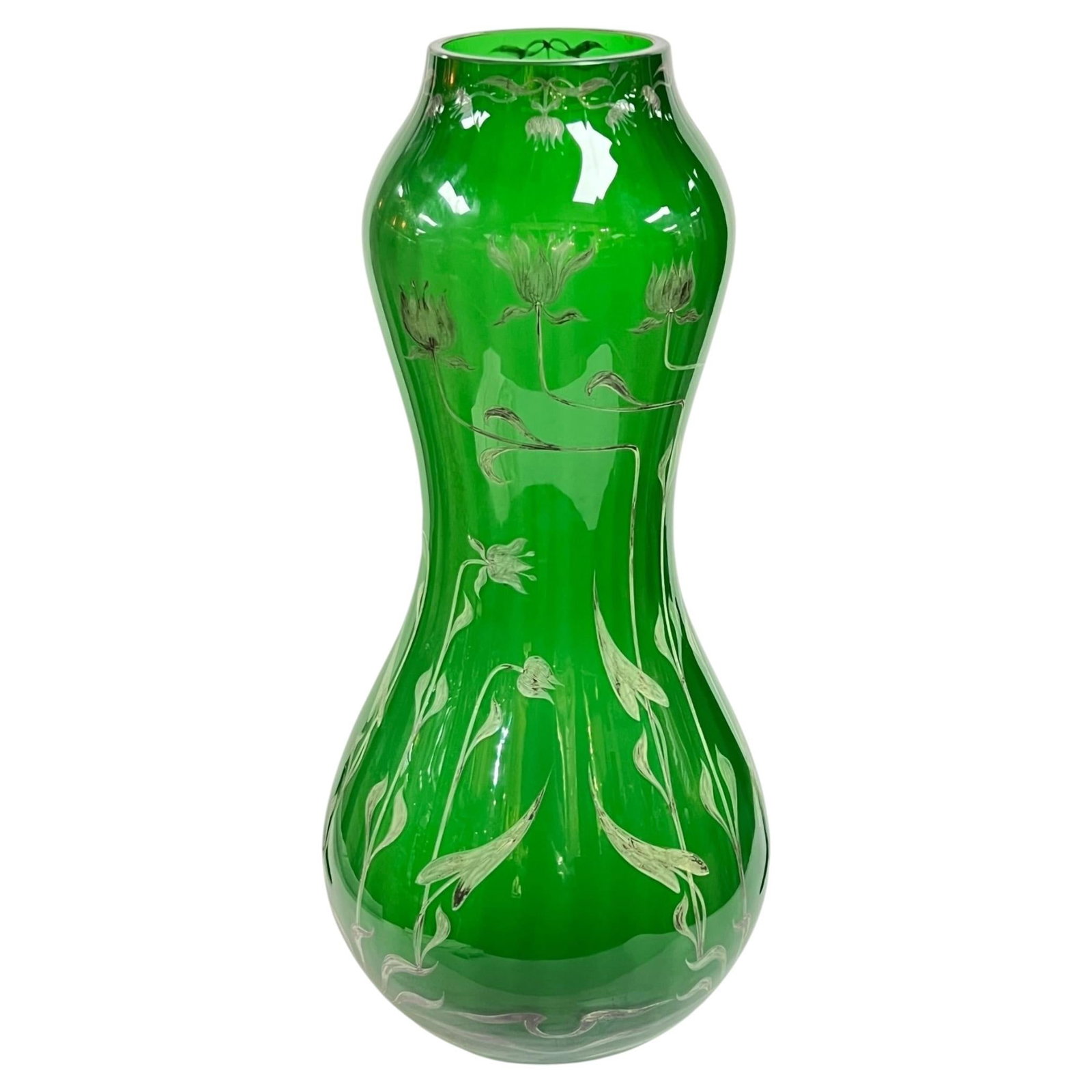French Art Nouveau Green Art Glass Vase 23.75 in Lily Motif: French Art Nouveau Green Art Glass Vase 23.75 in Lily Motif This is a very large French Art Nouveau period green glass vase from the early 1900s. It features a stylized lily flower motif rendered in s