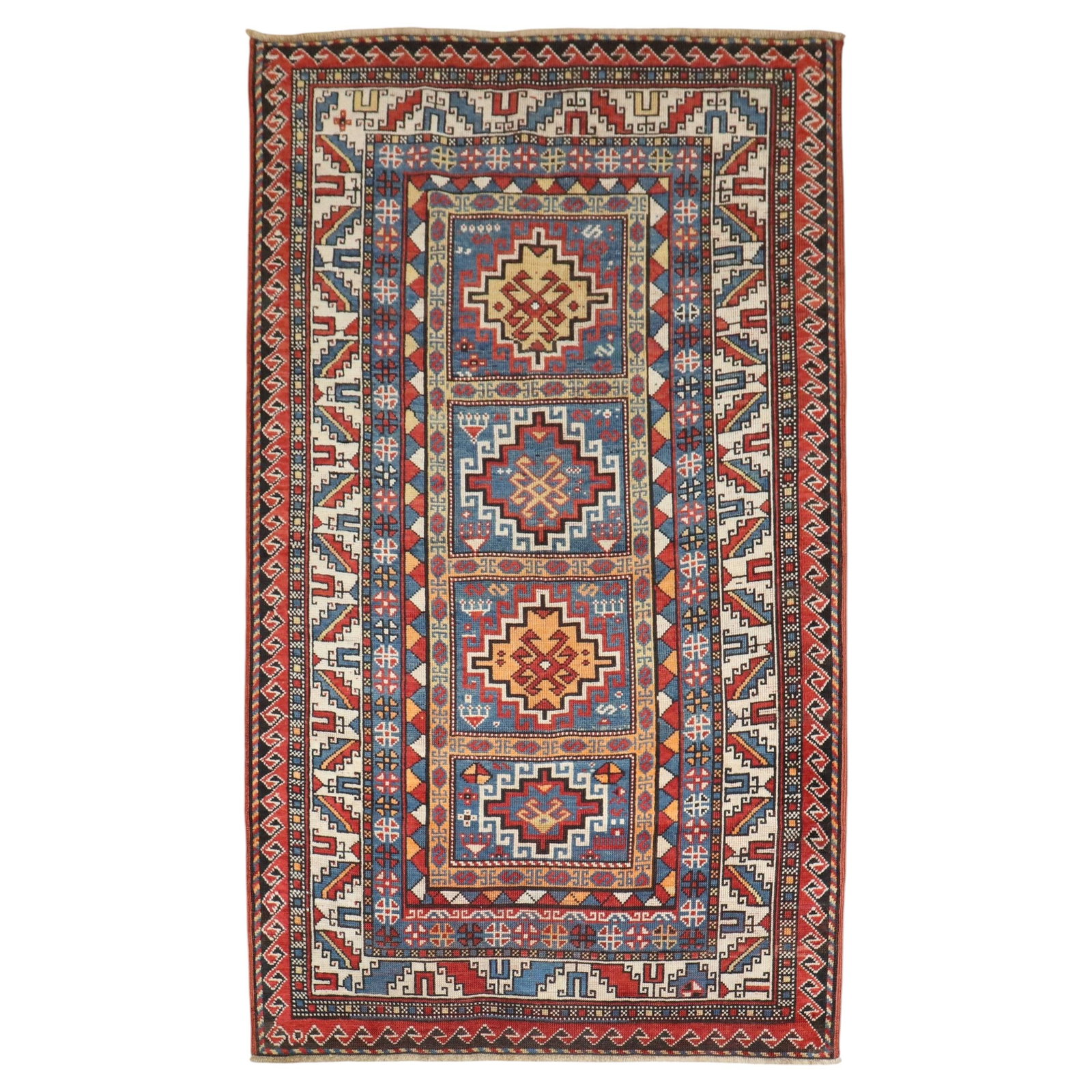 Late 19th Century Blue Moghhan Kazak Wool Rug 3'9 x 5'11: Late 19th Century Blue Moghhan Kazak Wool Rug 3'9 x 5'11 This is a late 19th century Moghhan Kazak rug from the Caucasus region, featuring a traditional Kazak style. Hand-woven from wool, this pre-own