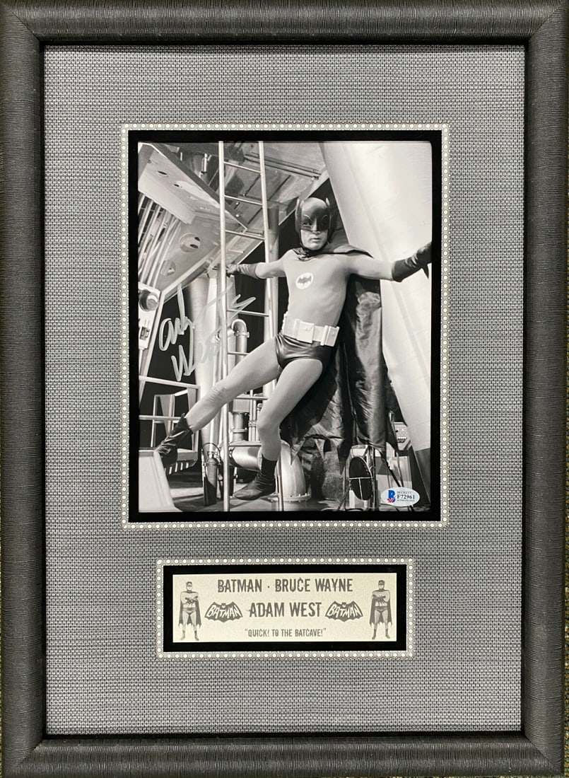Adam West Batman Signed 8x10 Photo Custom Framed Beckett COA: Adam West Batman Signed 8x10 Photo Custom Framed Beckett COA This stunning display features an 8x10 black and white photo of Adam West as Batman, custom framed to a size of 14 1/2" x 20". The photo is