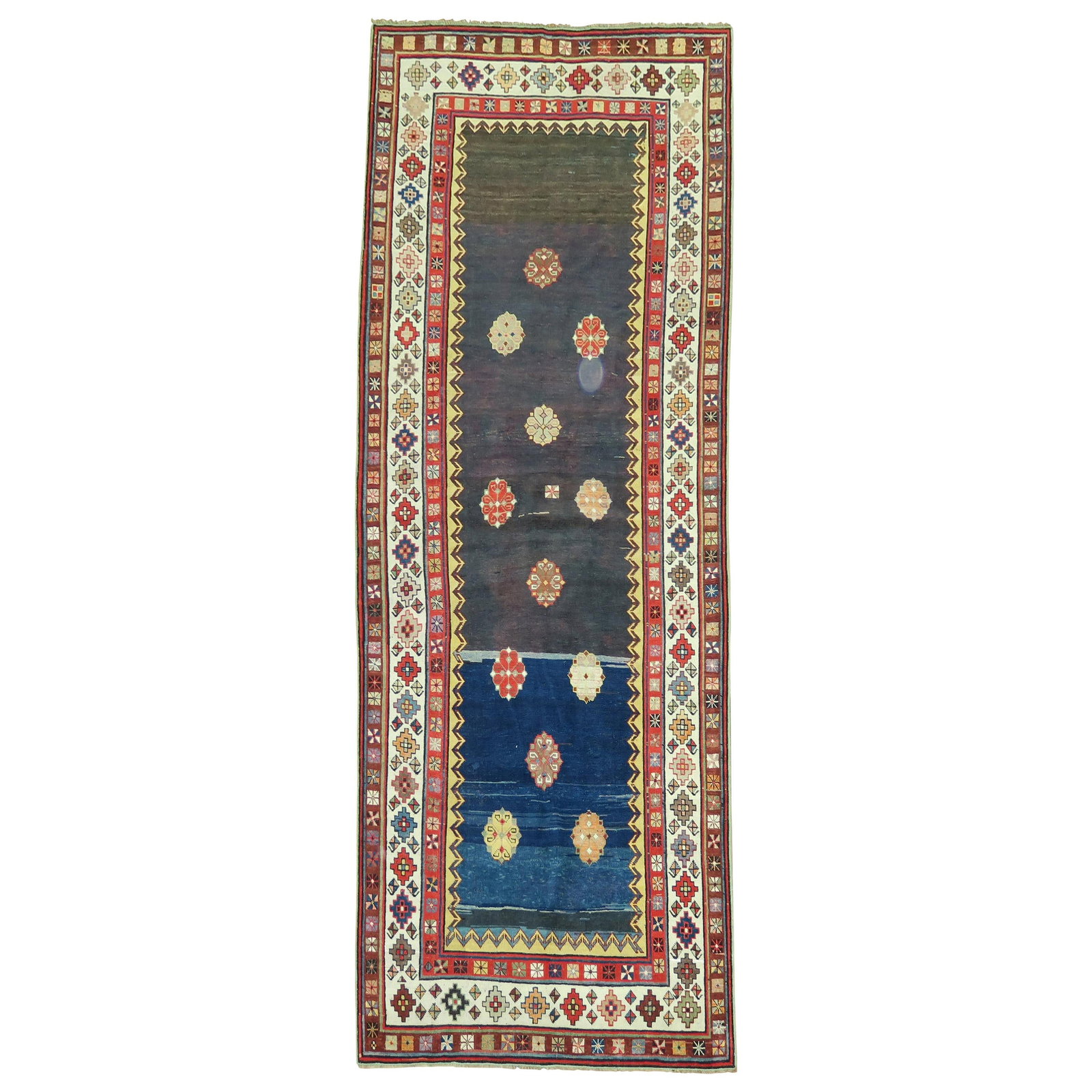 Talish Kazak Wool Runner 3'6 x 9'2: Talish Kazak Wool Runner 3'6 x 9'2 This early 20th-century Talish runner from the Caucasus features a hand-woven wool construction in a striated blue and navy field, accented by a colorful geometric b