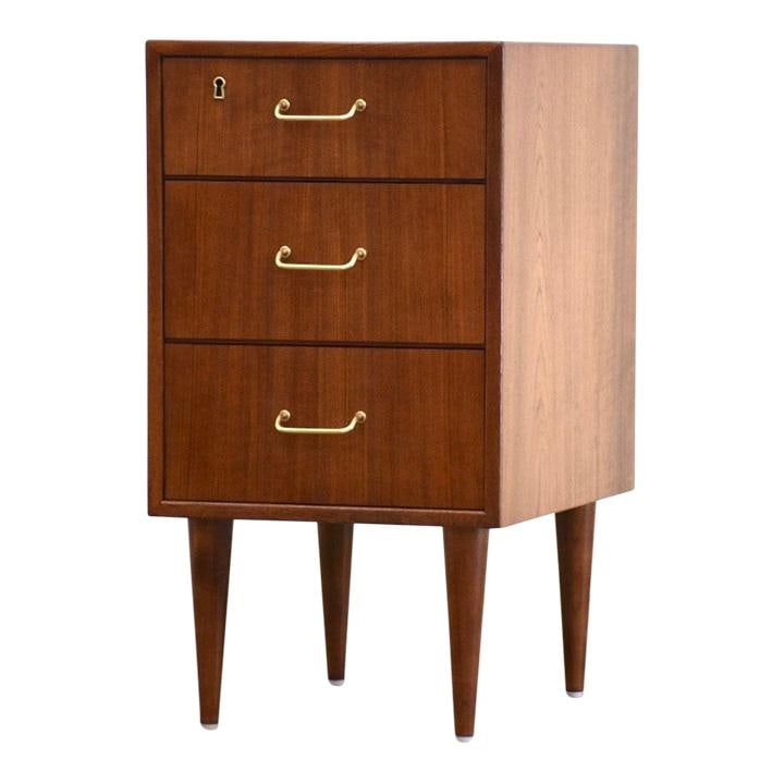 Torben Strandgaard Danish Modern Teak Dresser with Brass Pulls: Torben Strandgaard Danish Modern Teak Dresser with Brass Pulls Discover this exquisite mid-century modern teak dresser designed by Torben Strandgaard for Falster. This versatile piece can serve as an 