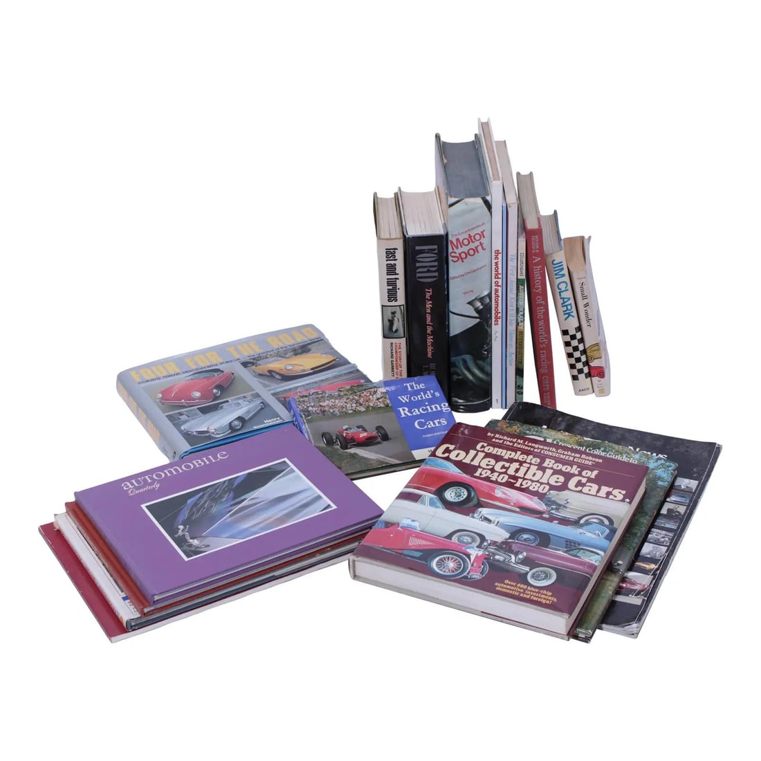 Automotive Books and Periodicals Collection: Automotive Books and Periodicals Collection This is a vintage collection of automotive and car books and periodicals, featuring a diverse range of titles spanning from the 1960s to the 2010s. The coll