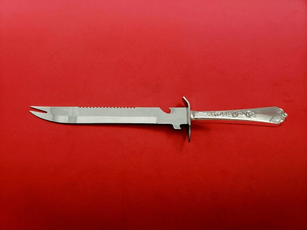 Wallace Sterling Rose Custom Ham Slice 11 1/2 Inch Knife: Wallace Sterling Rose Custom Ham Slice 11 1/2 Inch Knife This exquisite Sterling Rose ham slice by Wallace is a custom-made piece crafted from high-quality sterling silver. Designed for both beauty an