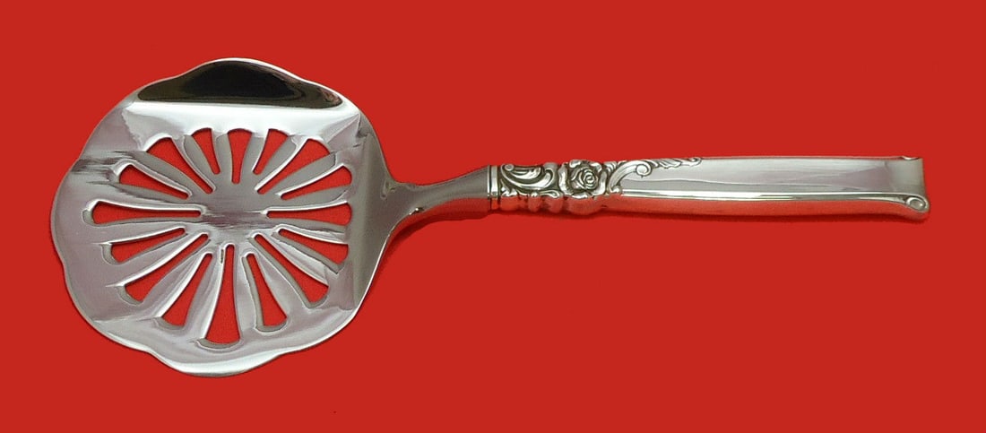 Oneida Silver Rose Custom Made Sterling Silver Tomato Server: Oneida Silver Rose Custom Made Sterling Silver Tomato Server This exquisite Silver Rose Tomato Server is crafted from sterling silver and features a hollow handle with a durable stainless implement. M