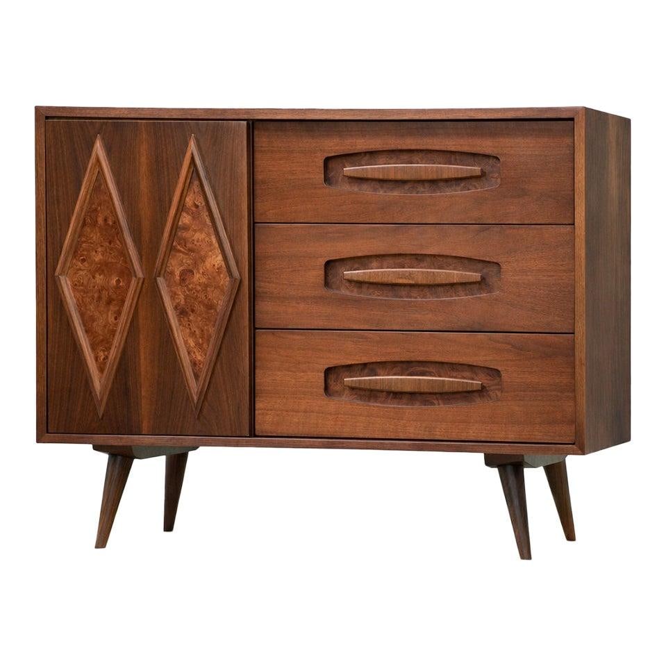 Mid Century Walnut Six Drawer Chest with Burl Accents and Sliding Door: Mid Century Walnut Six Drawer Chest with Burl Accents and Sliding Door This mid-century modern dresser chest features six drawers, a sliding door, and elegant burl wood details. Crafted from walnut, i