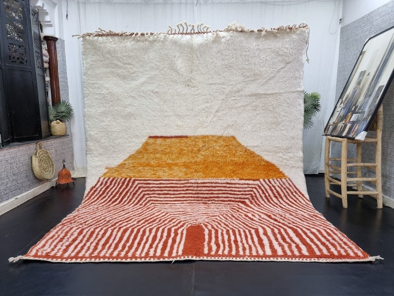 Handmade Moroccan Berber Rug 100% Sheep Wool 9.84 x 6.56 Feet: Handmade Moroccan Berber Rug 100% Sheep Wool 9.84 x 6.56 Feet Experience the warmth and charm of this lovely handmade Moroccan Berber rug, beautifully crafted by local Berber women weavers in the Atla