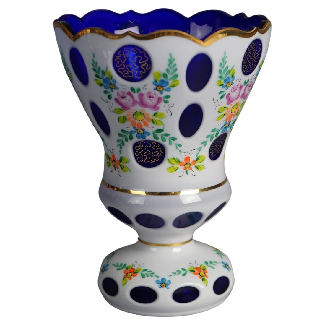 20th Century Bohemian Hand Painted Gilt Cobalt Footed Vase: 20th Century Bohemian Hand Painted Gilt Cobalt Footed Vase This exquisite Bohemian glass vase from the 20th century showcases a stunning cobalt cut to clear design. It features intricate hand-painted 