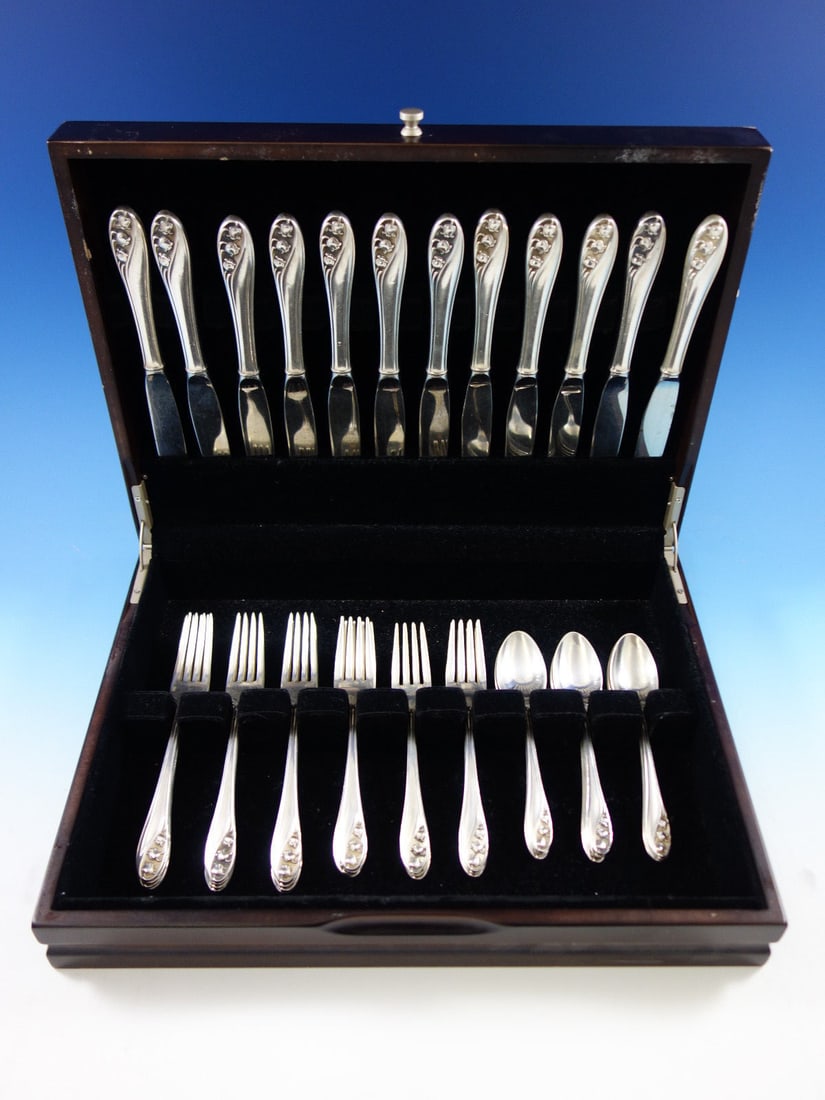 48 Piece Gorham Lily of the Valley Sterling Flatware Service for 12: 48 Piece Gorham Lily of the Valley Sterling Flatware Service for 12 Gorham Lily of the Valley sterling silver flatware service for 12, consisting of 48 pieces. The set includes knives, forks, salad fo