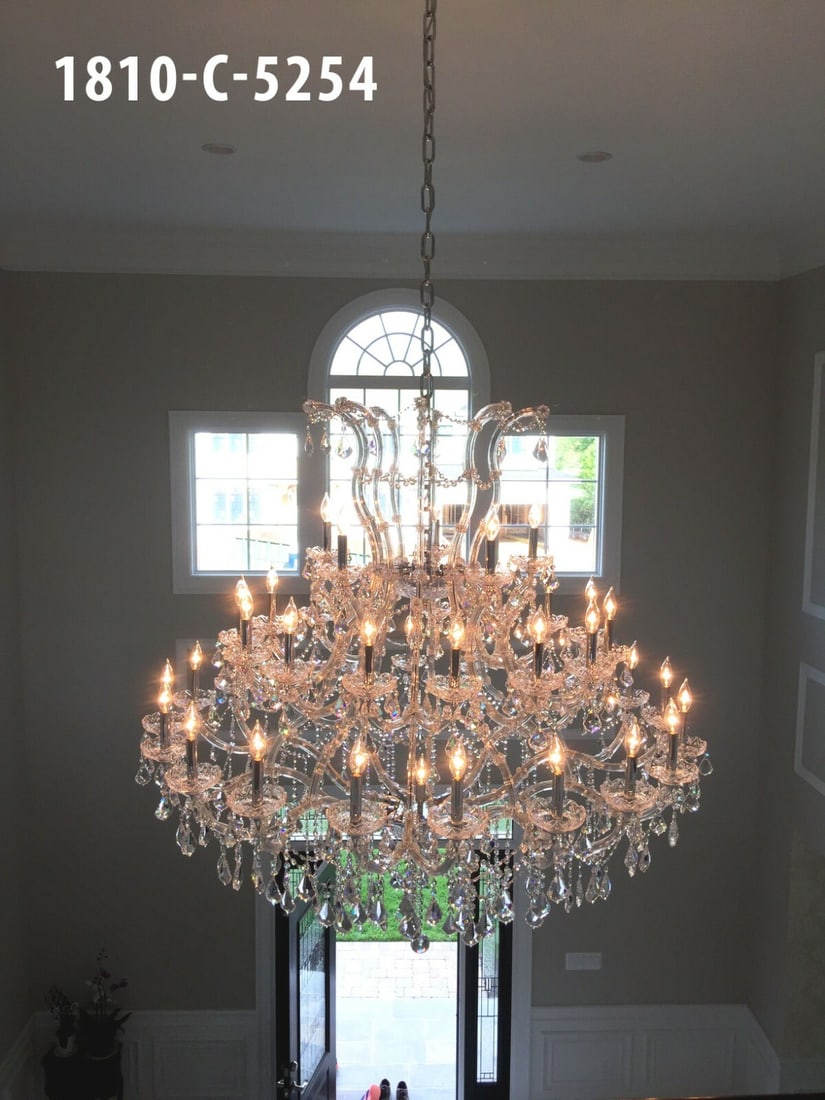 Maria Theresa 41-Light Crystal Chandelier 54in Chrome K9 Glass Elegance: Maria Theresa 41-Light Crystal Chandelier 54in Chrome K9 Glass Elegance Elevate your space with this stunning Maria Theresa Large Crystal Chandelier. Featuring 41 lights and crafted with exquisite Gra