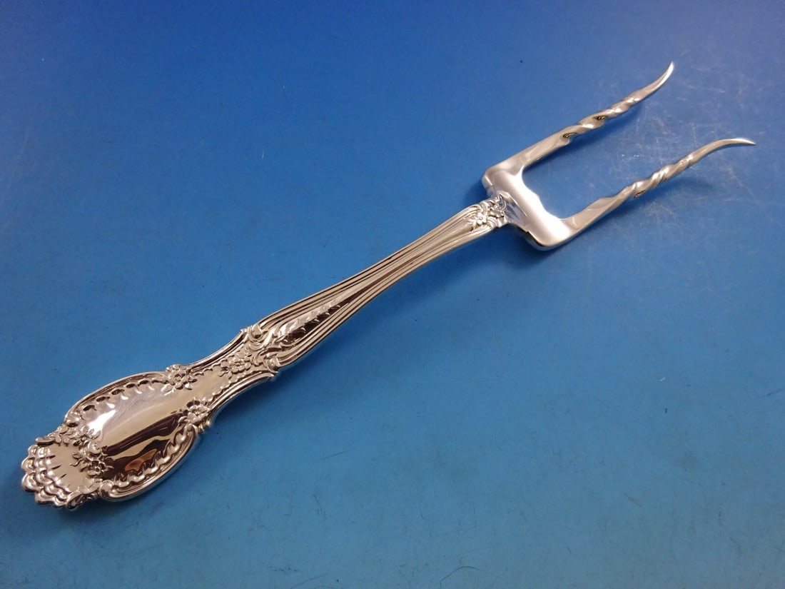 Tiffany & Co. Richelieu Sterling Silver Baked Potato Fork 7 Inch: Tiffany & Co. Richelieu Sterling Silver Baked Potato Fork 7 Inch This exquisite serving fork from Tiffany & Co. features the classic Richelieu pattern, crafted from high-quality sterling silver. Measu