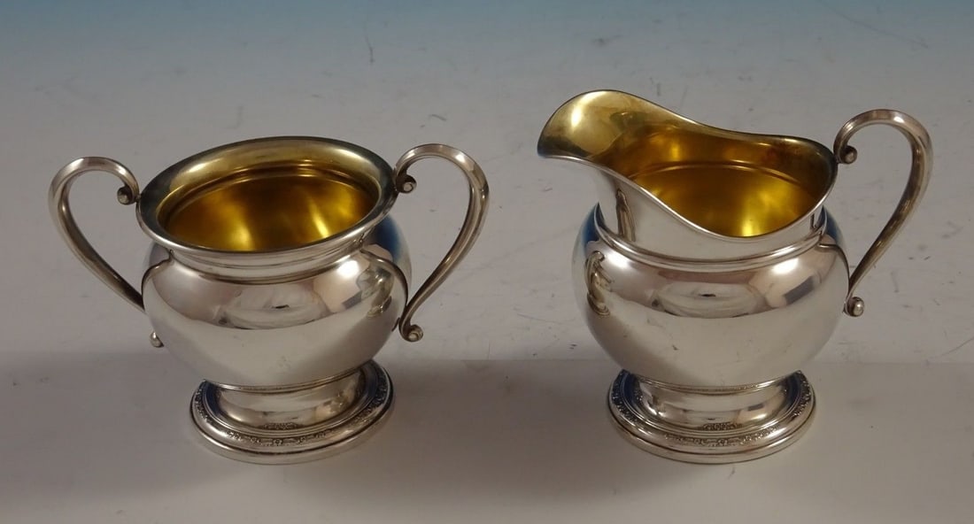 International Sterling Silver Courtship Sugar and Creamer Set 2pc: International Sterling Silver Courtship Sugar and Creamer Set 2pc Enhance your dining experience with this exquisite 2-piece sugar and creamer set from the Courtship pattern by International Sterling.