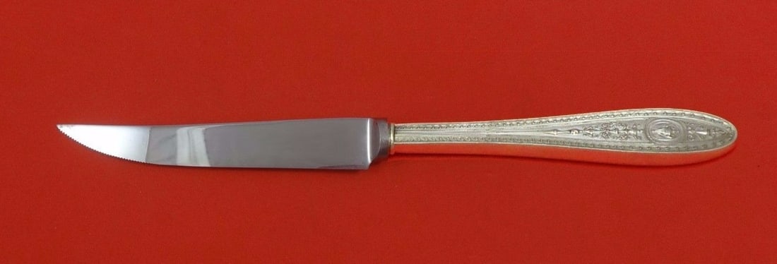 Wedgwood Pattern International Sterling Silver Steak Knife 8.5 Inch: Wedgwood Pattern International Sterling Silver Steak Knife 8.5 Inch This exquisite steak knife features the elegant Wedgwood pattern by International. Crafted from sterling silver, it boasts a hollow 