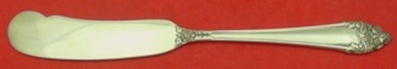Sterling Silver Butter Spreader Fragrance Pattern Flat Handle 6 Inch: Sterling Silver Butter Spreader Fragrance Pattern Flat Handle 6 Inch This butter spreader features a flat handle design and is crafted in sterling silver. It is part of the Fragrance pattern by Reed &