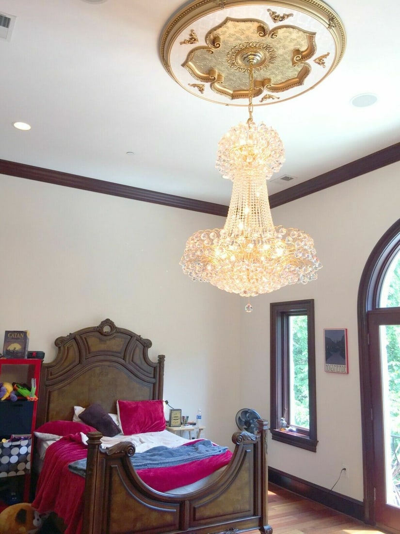 Artistry Sirius 24 Light Crystal Chandelier Gold Finish 48 x 36: Artistry Sirius 24 Light Crystal Chandelier Gold Finish 48 x 36 Large modern crystal chandelier with a gold finish and 24 lights. The fixture features clear Grand King K9 crystals and is part of the S
