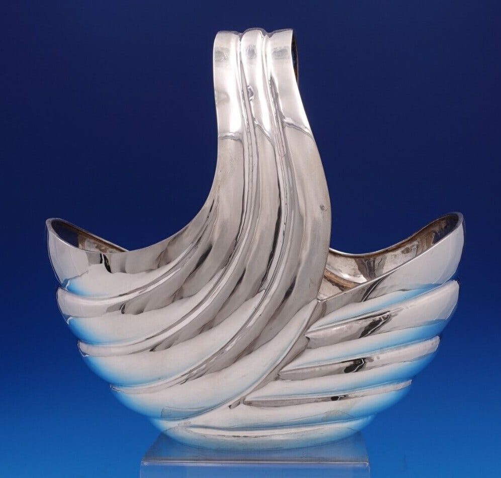 Mid-Century Modern .900 Silver Basket 10 x 6 x 9.75 27.5 ozt: Mid-Century Modern .900 Silver Basket 10 x 6 x 9.75 27.5 ozt This exquisite mid-century modern basket is crafted from .900 silver, showcasing a sleek and stunning design. Measuring 10" in length, 6" i