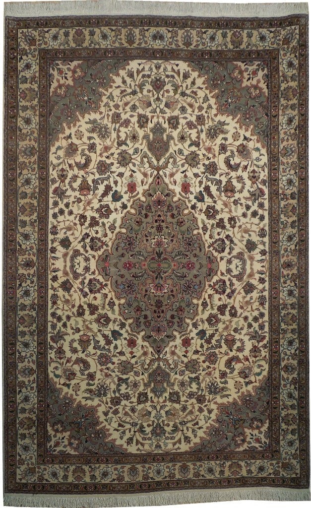 5.9 x 9 Persian Tabriz Rug Iran Hand Knotted Wool Silk 400 KPSI: 5.9 x 9 Persian Tabriz Rug Iran Hand Knotted Wool Silk 400 KPSI Free continental US Shipping This fine quality Persian Tabriz rug measures 5.9 x 9 feet and is hand-knotted in Iran. It features a high-