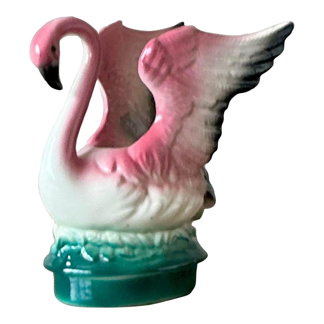 Mid-Century Modern Ceramic Flamingo Planter with Glazed Finish: Mid-Century Modern Ceramic Flamingo Planter with Glazed Finish This vintage Mid-Century Modern flamingo planter features a whimsical design crafted from glazed ceramic. Showcasing soft pink, crisp whi