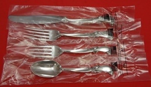 Wallace Waltz of Spring Sterling Silver 4-Piece Place Setting: Wallace Waltz of Spring Sterling Silver 4-Piece Place Setting Enhance your dining experience with the exquisite 'Waltz of Spring' place setting by Wallace. Crafted from high-quality sterling silver, t