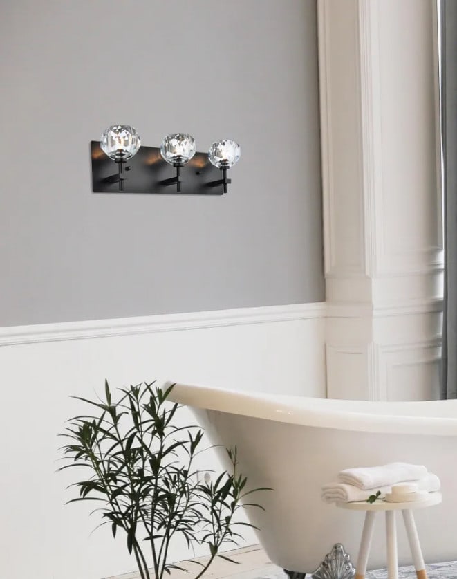 Graham Black Crystal 3 Light Wall Sconce Fixture: Graham Black Crystal 3 Light Wall Sconce Fixture This modern wall sconce light fixture features a sleek black finish with clear crystal shades, adding a touch of elegance to any indoor space. Designed