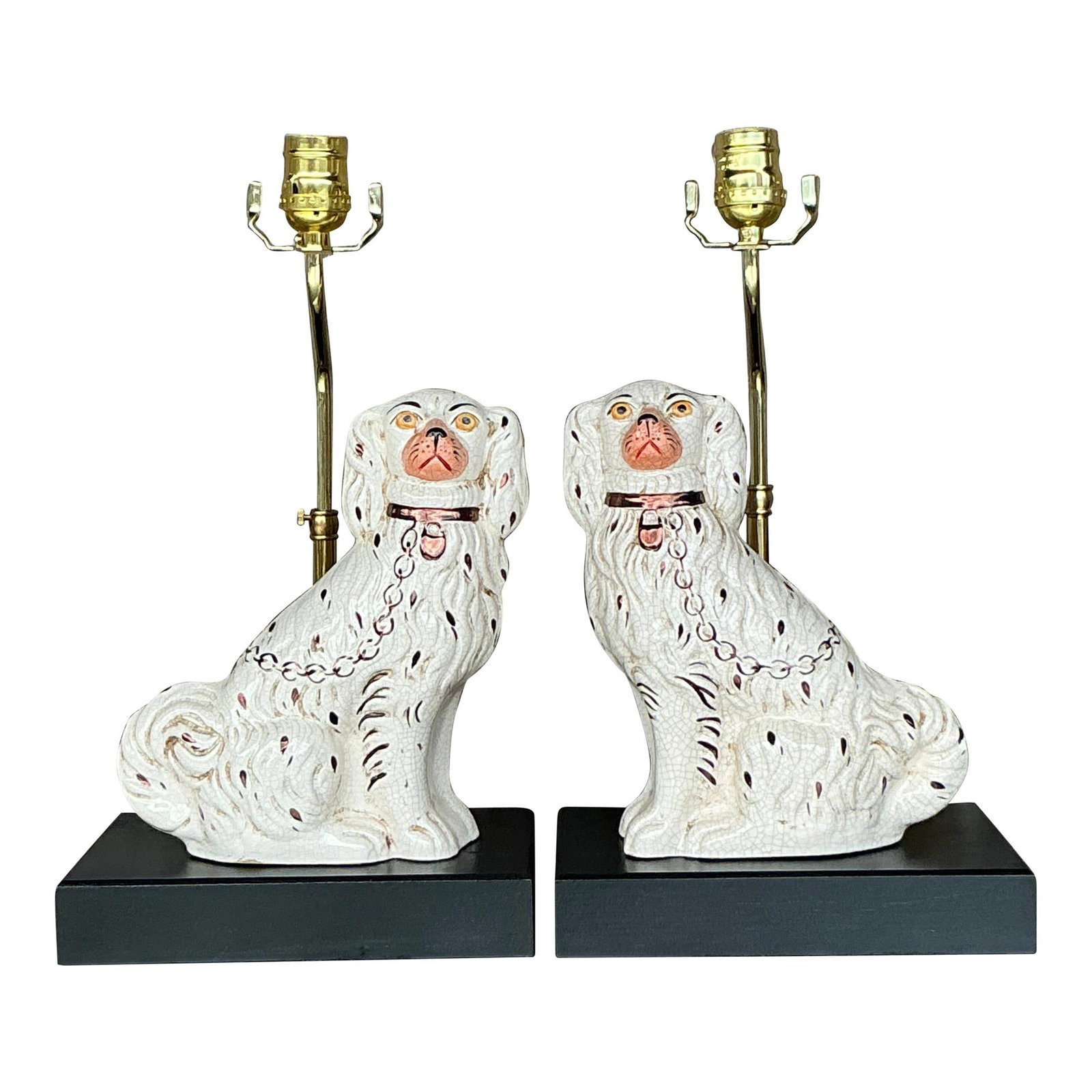Regency Vintage Staffordshire Dog Lamp Pair with Brass Accents: Regency Vintage Staffordshire Dog Lamp Pair with Brass Accents Enhance your home decor with this exquisite pair of vintage Staffordshire dog lamps. These lamps showcase elegant white Staffordshire spa