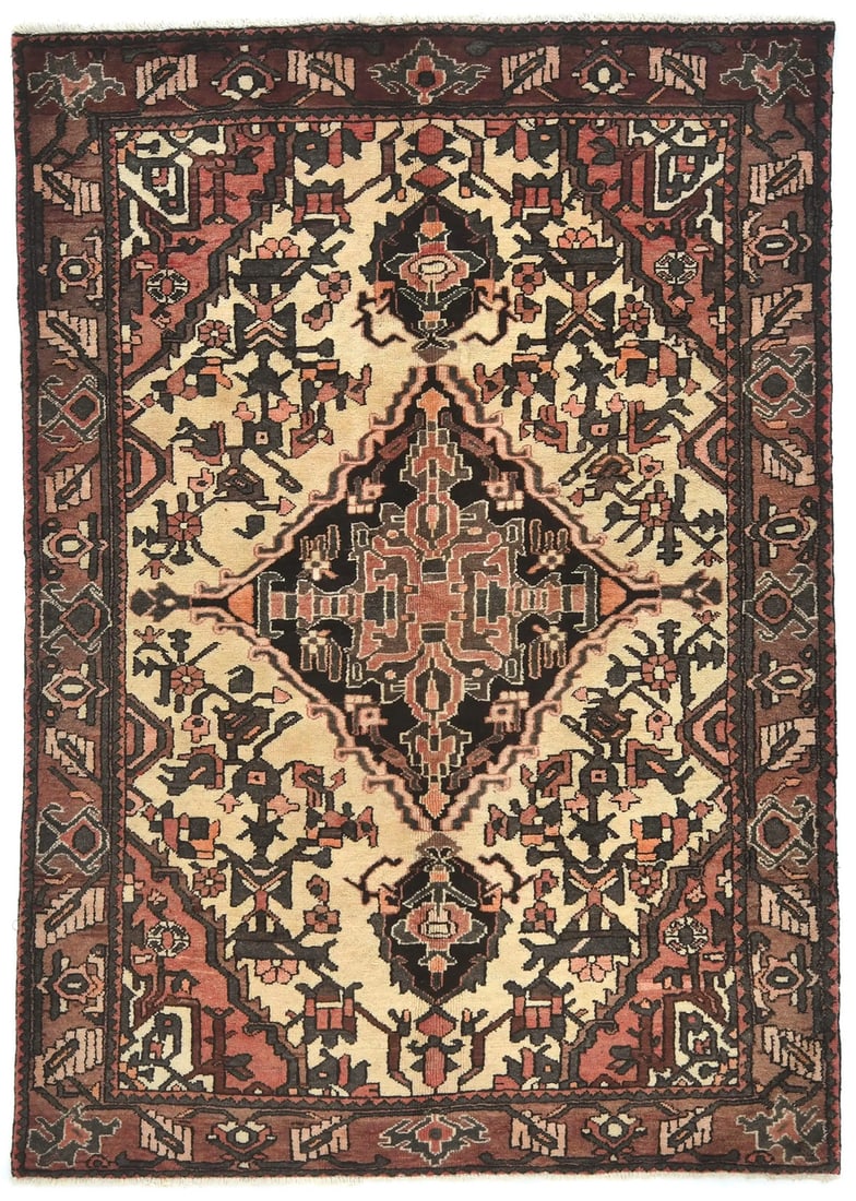 Vintage Tribal Floral Cream Wool Rug 5'2 x 7'6 Hand-Knotted: Vintage Tribal Floral Cream Wool Rug 5'2 x 7'6 Hand-Knotted Enhance your space with this exquisite vintage Oriental rug, featuring a beautiful floral pattern in a cream base accented by dark brown and