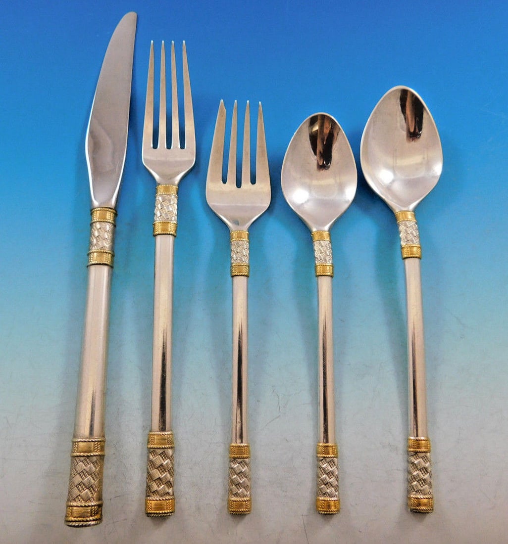 Wallace Aegean Weave Gold sterling silver service for 12 60 pieces: Wallace Aegean Weave Gold sterling silver service for 12 60 pieces This Wallace "Aegean Weave Gold" flatware set features gold-accented sterling silver pieces in a contemporary pattern inspired by cla