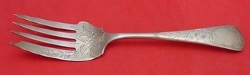 Gorham Clematis Sterling Silver Brite-Cut Serving Fork 8 1/4": Gorham Clematis Sterling Silver Brite-Cut Serving Fork 8 1/4" This exquisite serving fork, part of the Clematis pattern by Gorham, is crafted from high-quality sterling silver. With a length of 8 1/4 