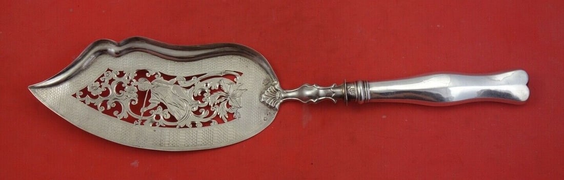 Austrian .800 Silver Fish Server Pierced Blade 12 1/2": Austrian .800 Silver Fish Server Pierced Blade 12 1/2" This exquisite Austrian silver fish server features a hollow handle and a beautifully pierced and engraved blade depicting a man. Crafted from .8
