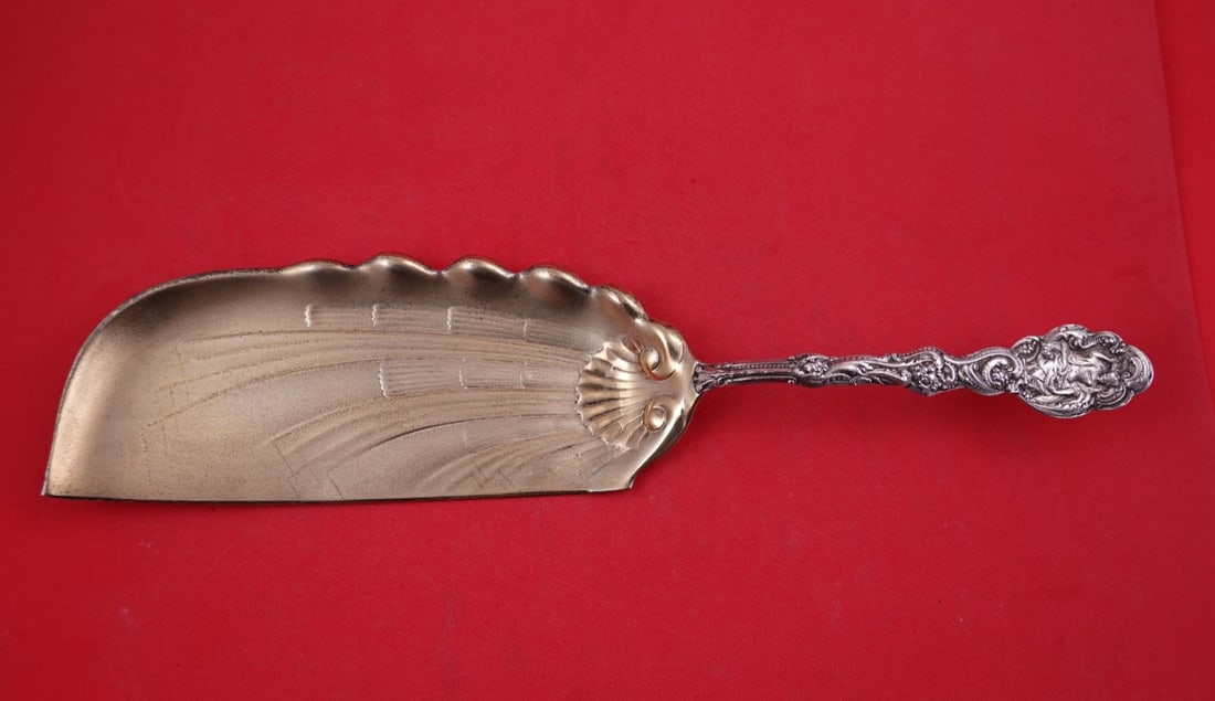 Gorham Versailles Sterling Silver Shell Crumber Gold Washed 12 1/2": Gorham Versailles Sterling Silver Shell Crumber Gold Washed 12 1/2" Gorham Versailles sterling silver crumber with a shell bowl and gold washed finish. It is monogrammed, with monograms varying, and i