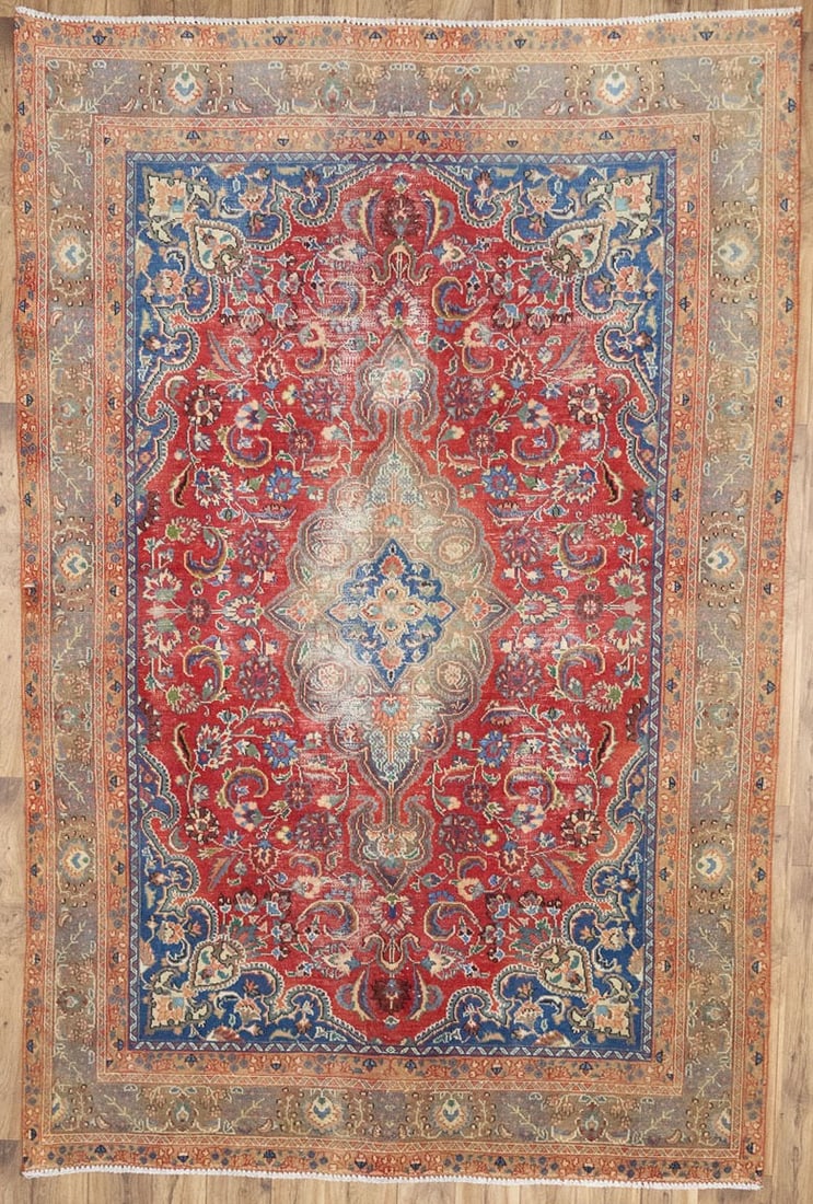 Hand-Knotted Wool Floral Vintage Rug 6x9 Ft: Hand-Knotted Wool Floral Vintage Rug 6x9 Ft This semi-antique oriental rug features a traditional floral pattern in beautifully muted tones of red, brown, cream, peach, beige, blue, and green. Hand-kn