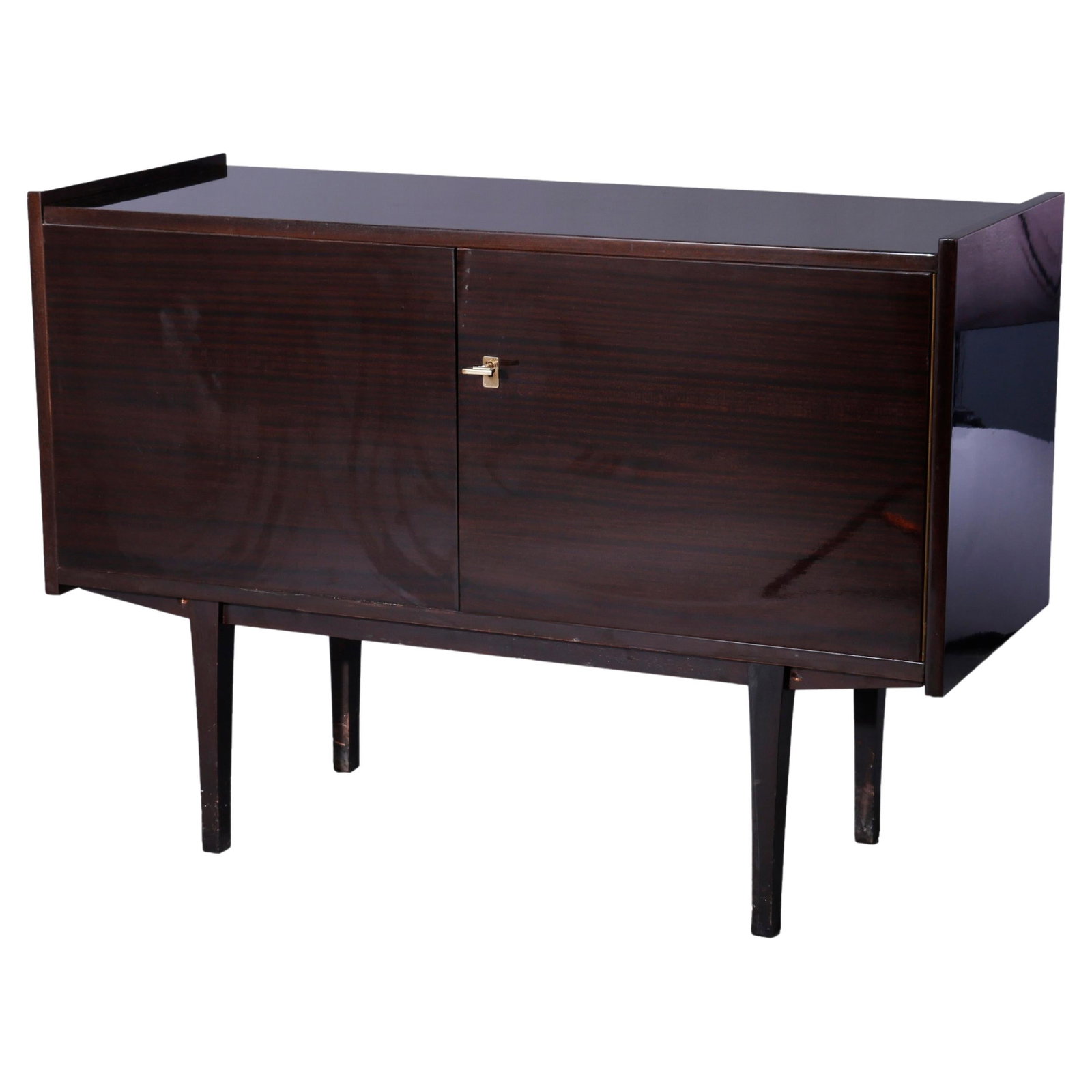 Ebonized Wood Credenza With Double Doors Mid Century Modern Design c1960: Ebonized Wood Credenza With Double Doors Mid Century Modern Design c1960 This Mid Century Modern credenza from circa 1960 features a sleek ebonized finish and minimalist design. The double doors with 