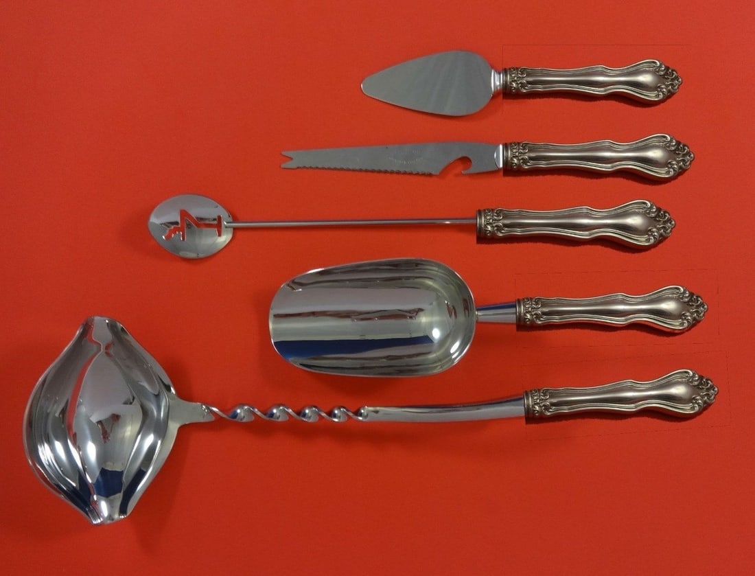 Westmorland George and Martha 5-Piece Sterling Silver Cocktail Set: Westmorland George and Martha 5-Piece Sterling Silver Cocktail Set Elevate your cocktail parties with the George and Martha Hostess Set by Westmorland. This exquisite 5-piece bar serving set is crafte