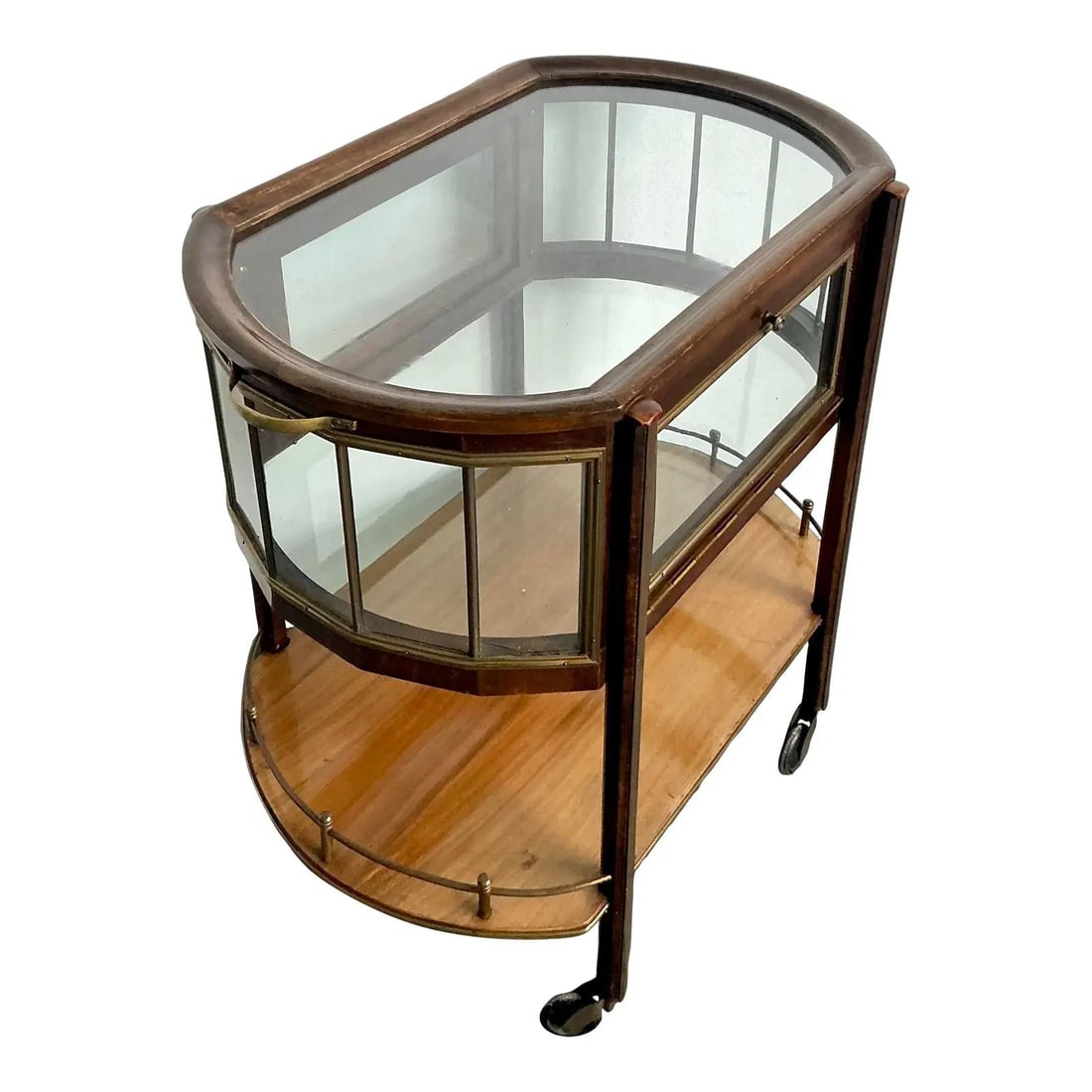 Vitrine-Top Regency Style Bar Cart With Glass Sides And Brass Accents: Vitrine-Top Regency Style Bar Cart With Glass Sides And Brass Accents This vintage Regency bar cart features a unique vitrine-style top with glass side panels, allowing for the protected display of ba
