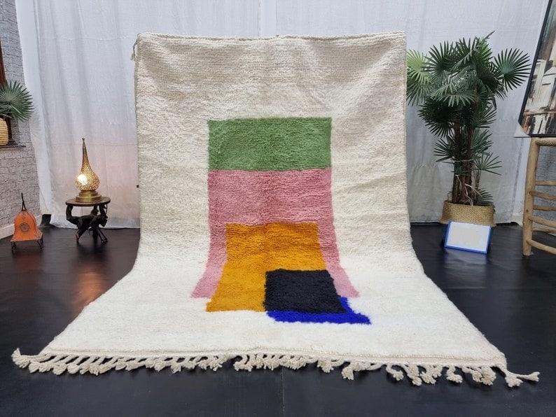 Handmade Moroccan Berber Rug 100% Natural Wool Geometric Design 9.84 x 6.56 Feet: Handmade Moroccan Berber Rug 100% Natural Wool Geometric Design 9.84 x 6.56 Feet Discover the elegance of this custom handmade Moroccan Berber rug, featuring a stylish design with geometric color squa