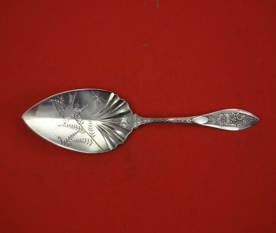 Shiebler Montezuma Sterling Silver Pie Server 9 Bright-Cut Bird Branch: Shiebler Montezuma Sterling Silver Pie Server 9 Bright-Cut Bird Branch Presenting a stunning pie server from the renowned Montezuma pattern by Shiebler. Crafted from high-quality sterling silver, this