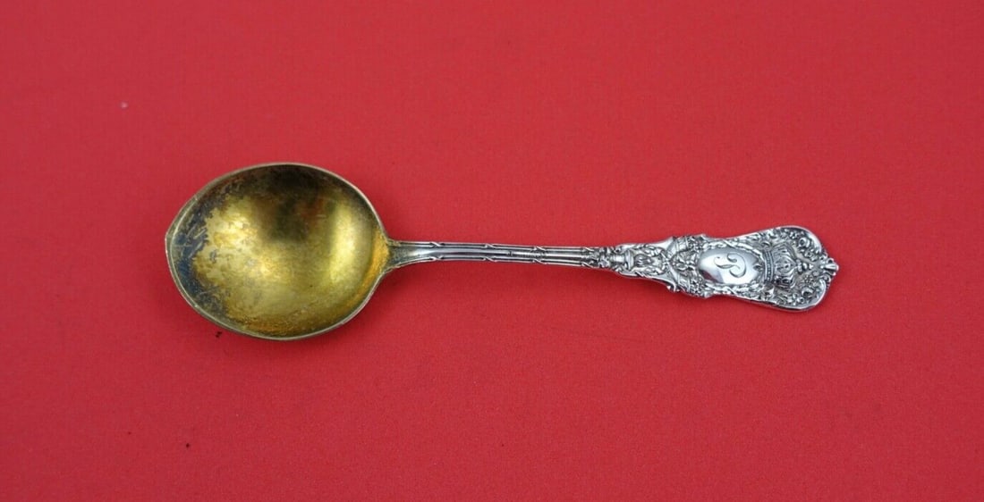 Durgin Empire Sterling Silver Chocolate Spoon Gold Washed 4 1/8": Durgin Empire Sterling Silver Chocolate Spoon Gold Washed 4 1/8" This exquisite chocolate spoon from Durgin features the elegant Empire pattern, crafted from high-quality sterling silver. The spoon is