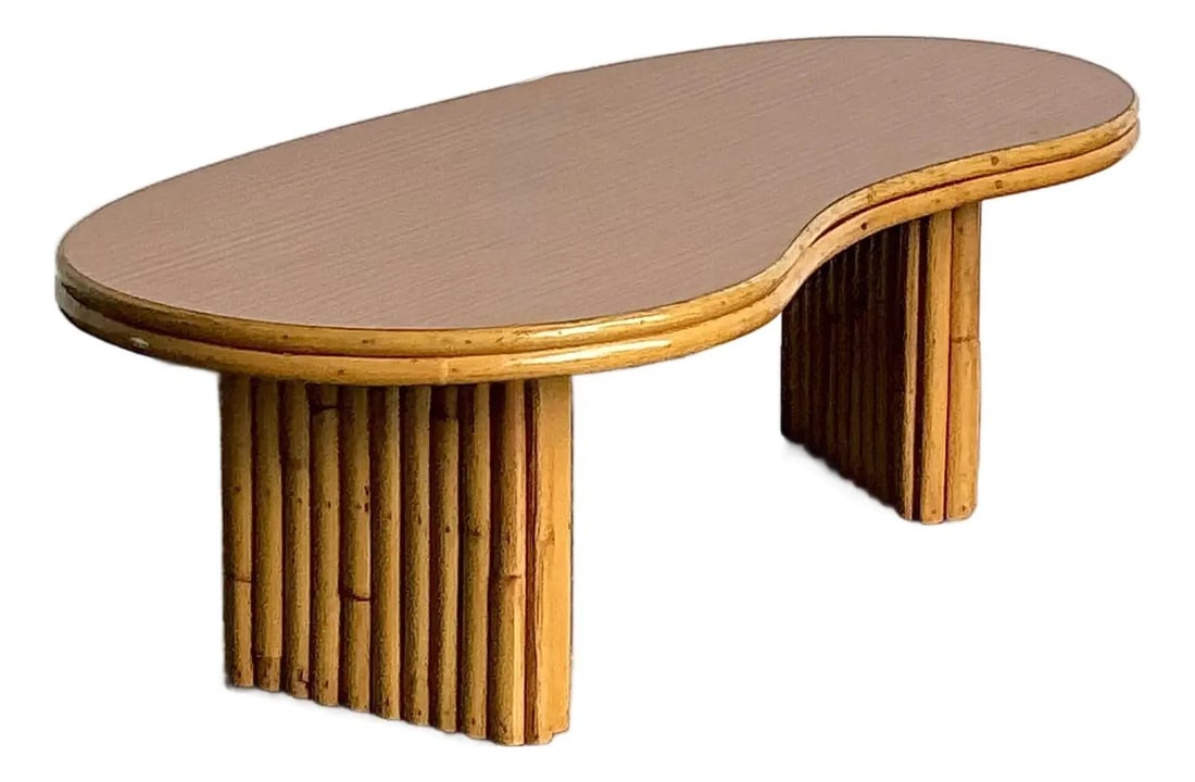 Mid Century Kidney Shaped Rattan Coffee Table Inspired by Frankl Design: Mid Century Kidney Shaped Rattan Coffee Table Inspired by Frankl Design This kidney-shaped coffee table from the 1950s embodies mid-century tropical modernism, with design inspiration attributed to Pa