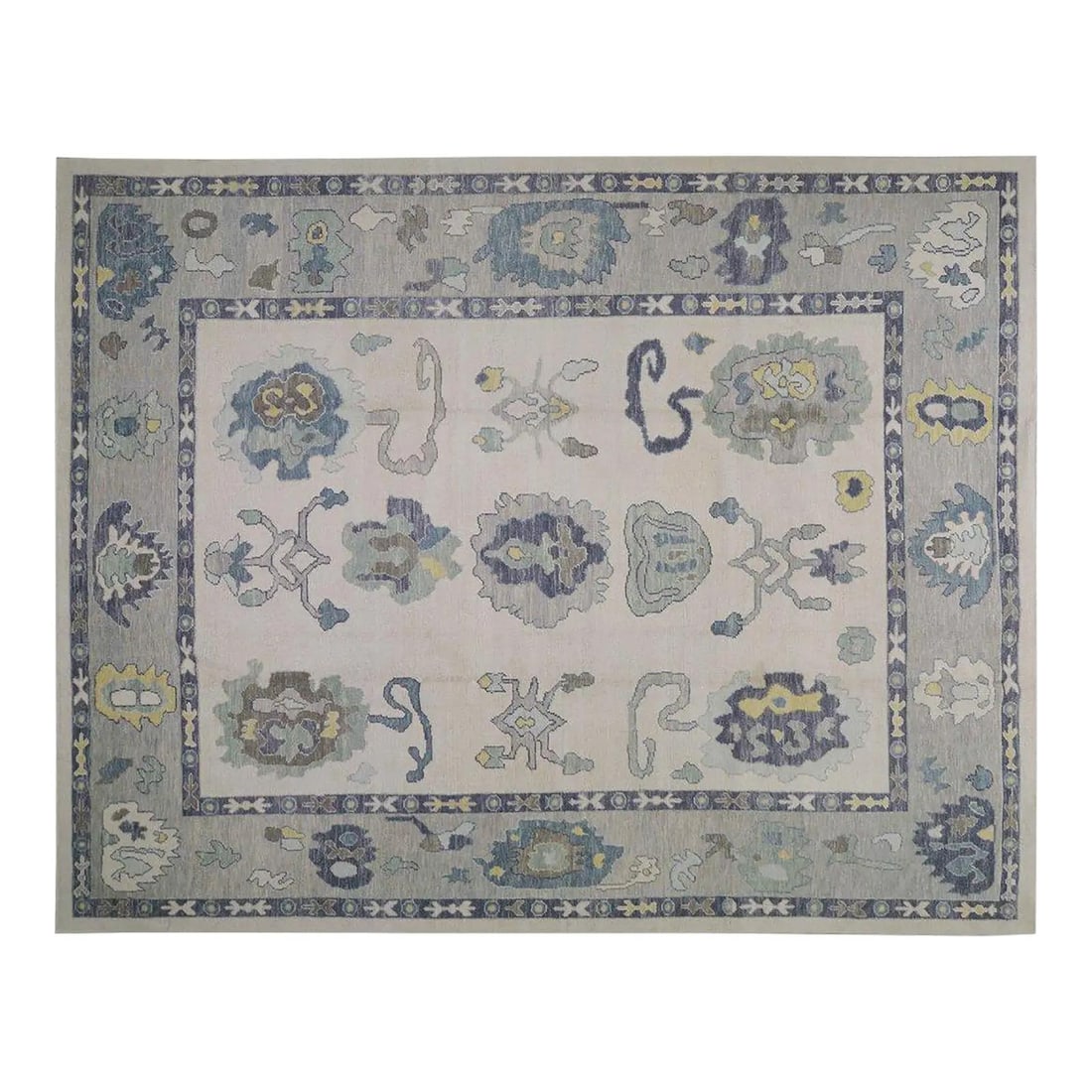 10'3 x 12'2 Hand-Knotted Wool Oushak Rug in Slate Gray: 10'3 x 12'2 Hand-Knotted Wool Oushak Rug in Slate Gray This Turkish Oushak rug is hand-knotted from wool using traditional techniques, resulting in a durable and richly textured piece. Its slate gray 