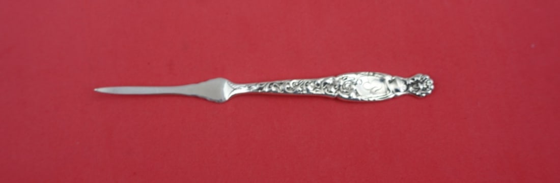 Whiting Heraldic Sterling Silver Nut Pick 5.5 Inches: Whiting Heraldic Sterling Silver Nut Pick 5.5 Inches This exquisite nut pick from the Heraldic pattern by Whiting is crafted from high-quality sterling silver. Measuring 5 1/2 inches, it showcases the