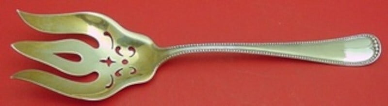 Gorham Newcastle Sterling Silver Gold Washed Salad Serving Fork 8 7/8": Gorham Newcastle Sterling Silver Gold Washed Salad Serving Fork 8 7/8" This exquisite salad serving fork from the Newcastle pattern by Gorham is crafted from sterling silver with a gold wash finish. M