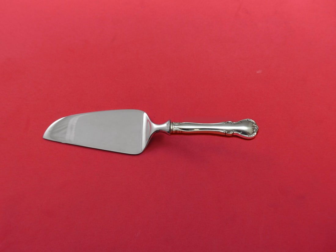 Towle French Provincial Sterling Silver Cheese Server 7 1/8 Inch: Towle French Provincial Sterling Silver Cheese Server 7 1/8 Inch This elegant cheese server from the French Provincial pattern by Towle features a sterling silver hollow handle complemented by a stain